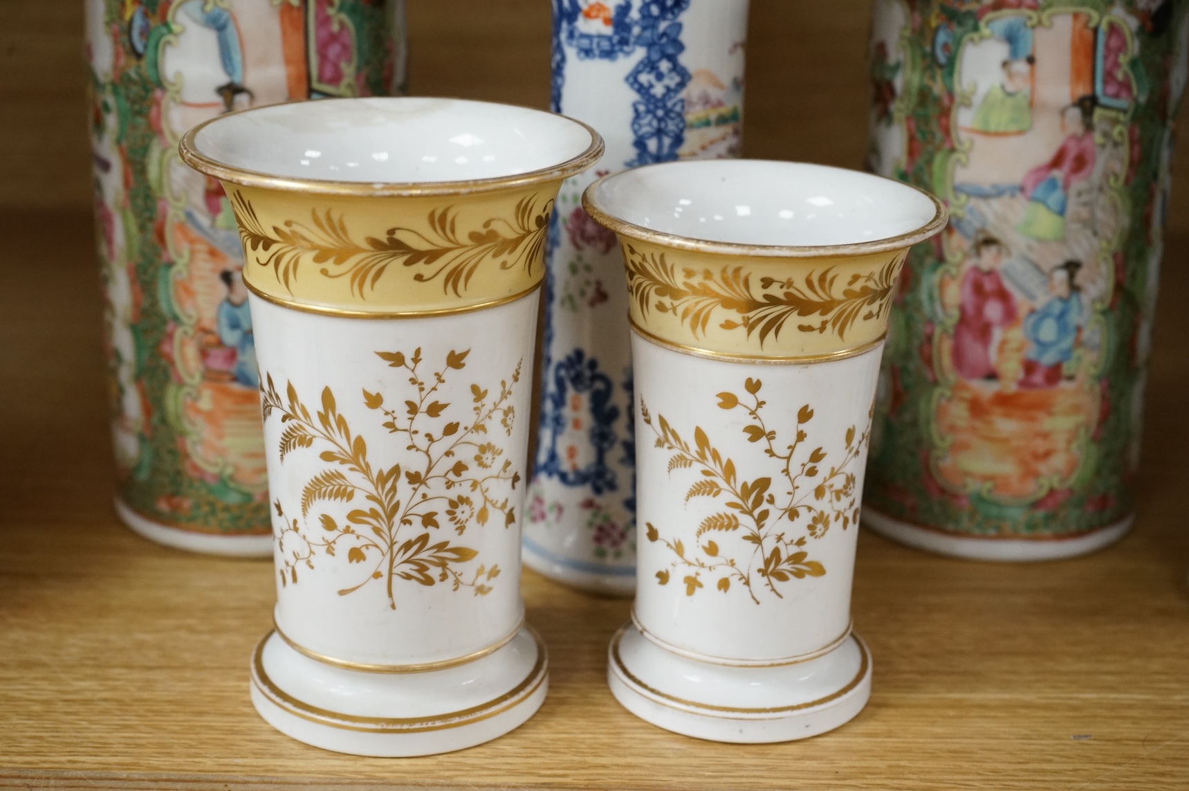 A pair of 18th century Chinese famille rose sleeve vases, a pair of 19th century Canton pattern vases and two English spill vases (6), tallest 25cm